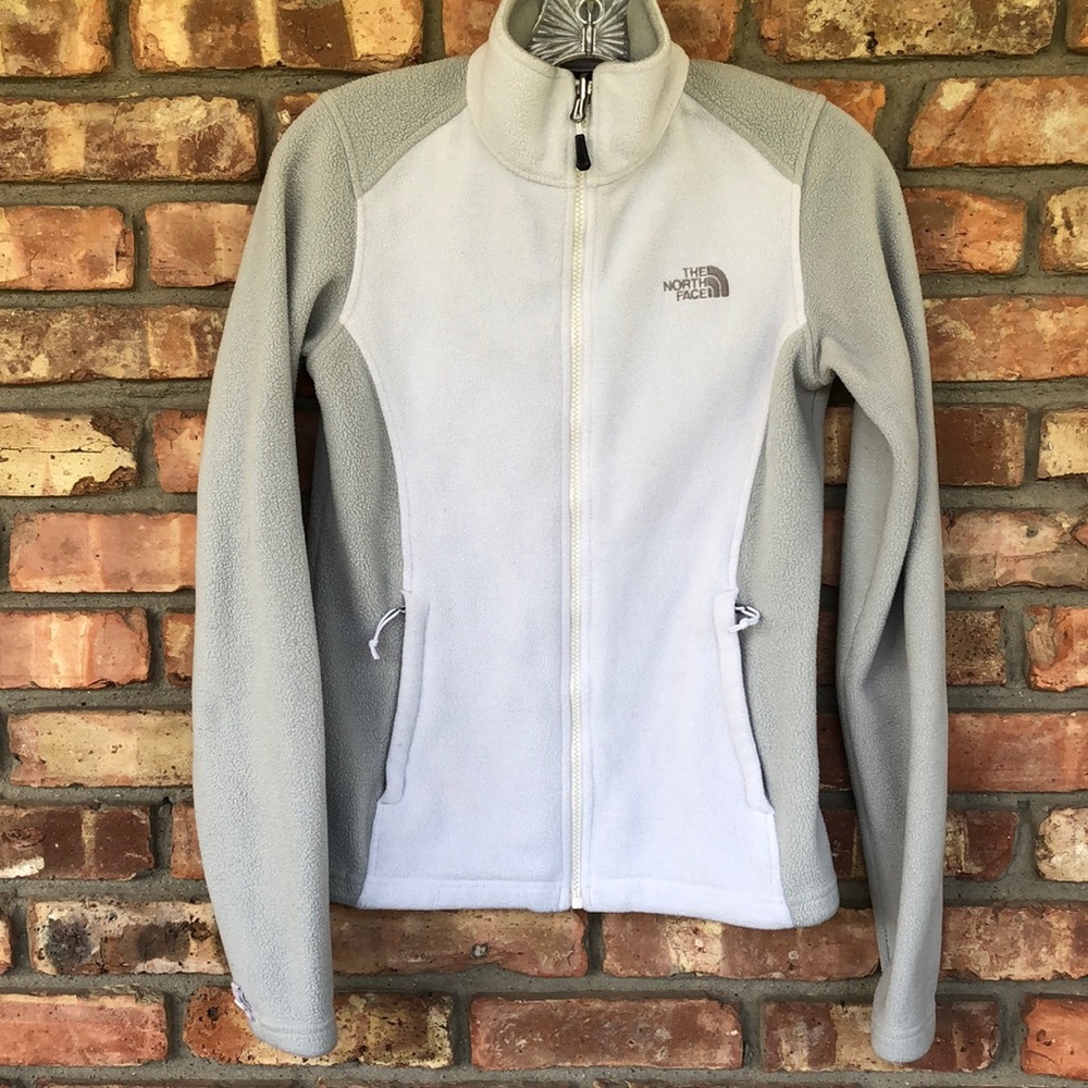 The North Face jacket. Gray and white.